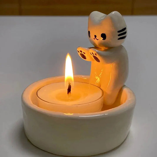 Cat Candle Holder. Cat-Shaped Candle Holder. Feline Decor. Animal Candle Holder. Cat Lover Gift. Decorative Candle Holder. Whimsical Cat Decor. Ceramic Cat Candle Holder. Metal Cat Candle Holder. Candle Holder with Cat Design. Cat Home Decor. Cute Candle Holder. Cat-Themed Decor. Unique Candle Holder. Handcrafted Cat Candle Holder.