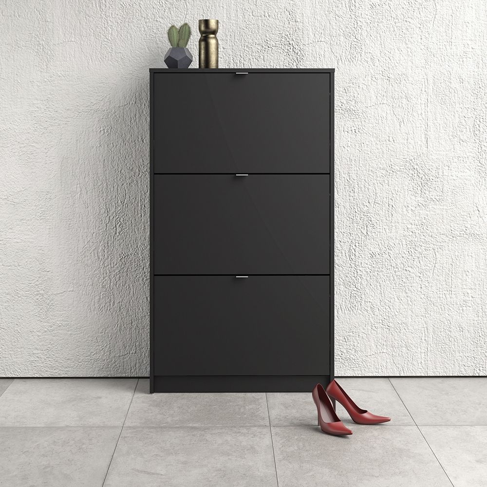 Chester Shoe Cabinet. Flip Down Shoe Storage. Matt Black Shoe Cabinet. Modern Shoe Organiser. Efficient Shoe Storage. Durable Shoe Cabinet. Tilting Doors. Contemporary Shoe Storage. Minimalist Design. Scratch-Resistant Material. Easy-to-Clean. High-Quality Fixings. Versatile Storage. Durable Storage Solution. UK Stockist. Next Day Delivery. Stylish Footwear Organizer. Sustainable Furniture. Practical Shoe Storage. Compact Shoe Cabinet. Furniture. Home Decor.