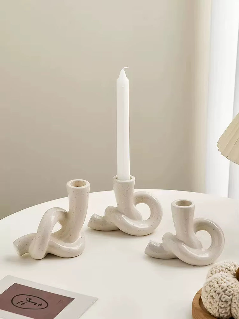 Ines Candle Holder. Rope-Inspired. Candle Holder. Elegant. Modern. Handcrafted. Sophisticated. Table. Mantel. Holiday. Cosy Ambience. Unique Design. Versatile. Classic Interior. Timeless. Decorative. UK Stockist. Quick Delivery. Home Decor. Special Occasion. Stylish. Elegant. Lighting Decor. White. Neutral. Home Decor. Accessories.